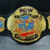 ECW Championship Belt replica with 4mm deep-etched plates and a brilliant gold finish.