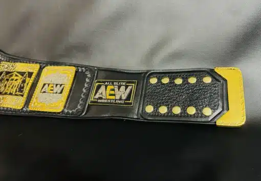 Genuine black leather strap of the AEW TNT Championship Belt with premium stitching.