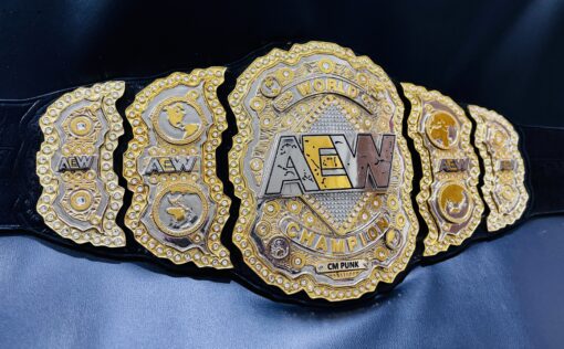 Close-up of the AEW World Championship Replica Belt featuring a custom removable nameplate.