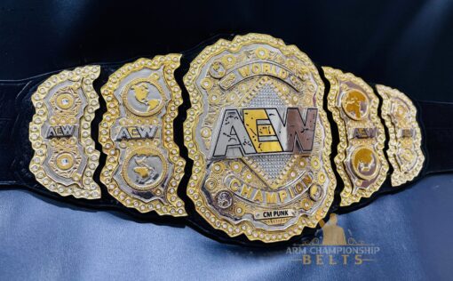 Close-up of the AEW World Championship Replica Belt featuring a custom removable nameplate.