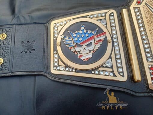 Close-up of Cody Rhodes American Nightmare replica side plates on the Undisputed WWE Universal Championship Belt.