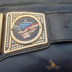 Close-up of Cody Rhodes American Nightmare replica side plates on the Undisputed WWE Universal Championship Belt