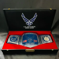 Custom championship belt case with red velvet interior and printed logo on the lid, designed for secure storage and protection of wrestling, military, and corporate championship belts.