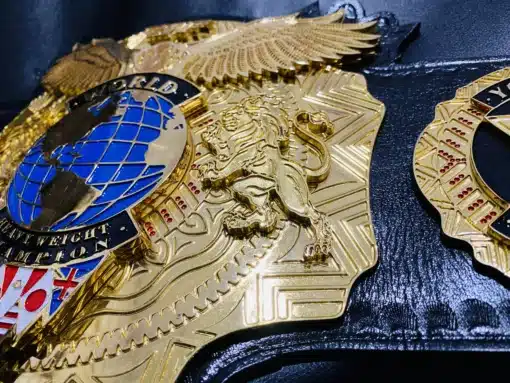 Custom wrestling belt designed for pro wrestlers, featuring deep-engraved plates and personalized logos for ultimate recognition.