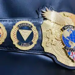 Fully customizable pro wrestling belt featuring engraved side plates and a genuine leather strap, perfect for wrestling champions.