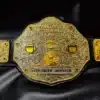 FFL Championship Belt with gold engraved plates, football icons, and a sleek black leather strap.