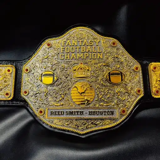 FFL Championship Belt with gold engraved plates, football icons, and a sleek black leather strap.