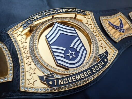 MSGT military championship belt with custom military logo and engraved plates for official recognition.