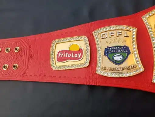 Fantasy football championship belt with a bold red genuine leather strap and gold-plated spinner plate.