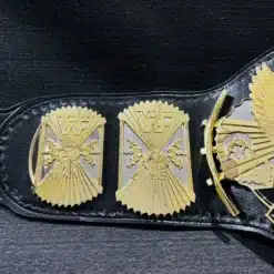 Winged Eagle replica belt featuring shiny gold plating and intricate engraved details.