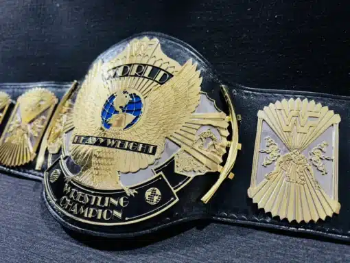 WWF belt winged eagle replica with customizable nameplate and leather strap.