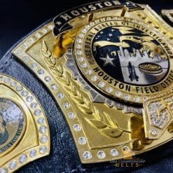 Customizable award belt with removable name plates for honoring FBI officers and their achievements.