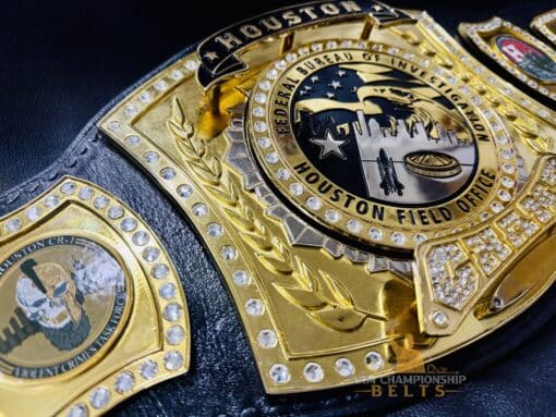 Customizable award belt with removable name plates for honoring FBI officers and their achievements.