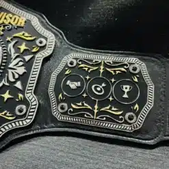 Side plates featuring engraved icons and design details of the Sales Champion Belt.