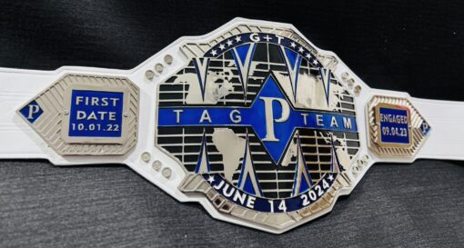 Side view showcasing the shiny chrome finish and detailed engravings on the Custom Tag Team Title Belt.