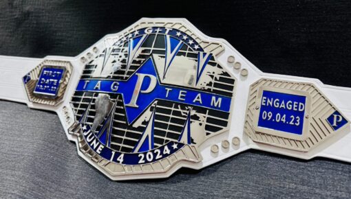 Side view showcasing the shiny chrome finish and detailed engravings on the Custom Tag Team Title Belt.