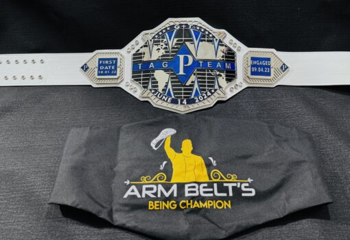 Custom Tag Team Title Belt displayed with bag, perfect for collectors.
