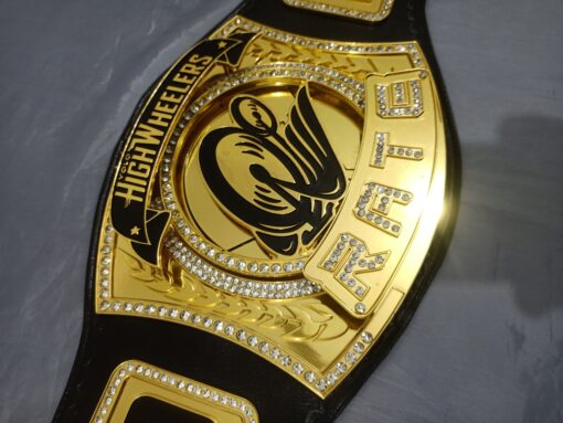 Close-up image of the Yolo High Wheelers Championship Belt focusing on the intricate HD CNC engraved plates.