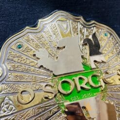 Detail shot of HD engraving on gold-plated plates of Custom Never Openweight Wrestling Belt