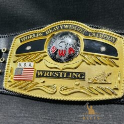 NWA Domed Globe Heavyweight Championship Belt laid flat on a genuine leather strap,