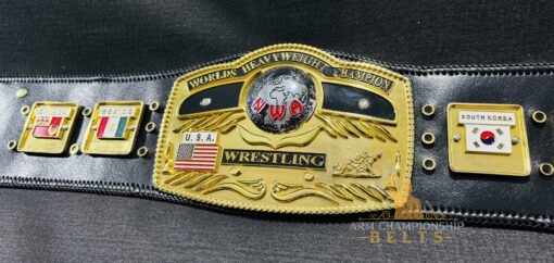 NWA Domed Globe Heavyweight Championship Belt laid flat on a genuine leather strap,