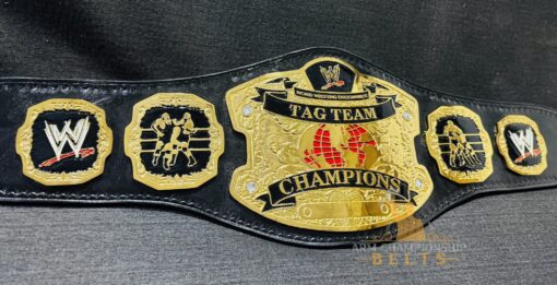 deep etching on the plates of the WWE RAW Ruthless Aggression World Tag Team Championship Belt, showcasing its intricate design.