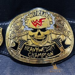 Detailed view of the gold plating on the Smoking Skull Championship Belt's zinc plates