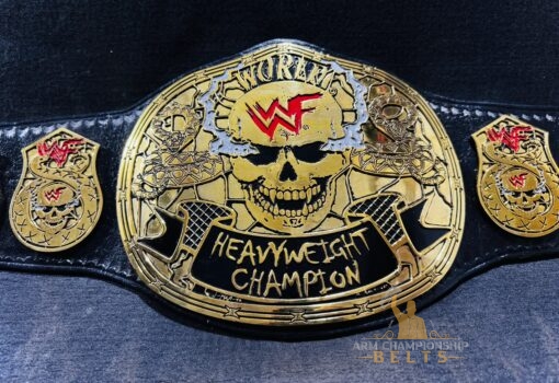 Detailed view of the gold plating on the Smoking Skull Championship Belt's zinc plates