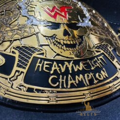 Gold finish on the Stone Cold Smoking Skull Championship Belt, highlighting the luxurious plating and detailed design