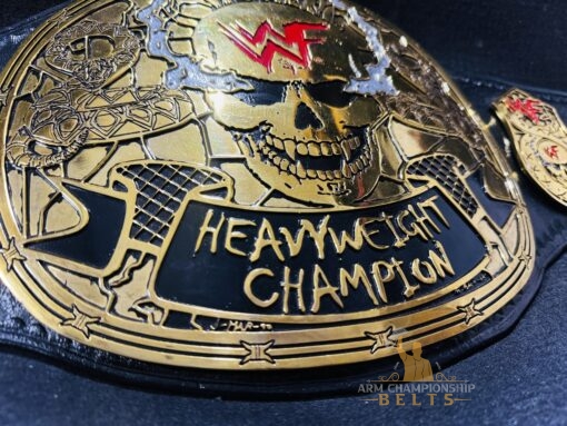 Gold finish on the Stone Cold Smoking Skull Championship Belt, highlighting the luxurious plating and detailed design