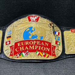 lose-up image highlighting the deep etching and gold finishing on the zinc plates of the WWF European Championship Replica Belt