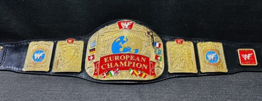 lose-up image highlighting the deep etching and gold finishing on the zinc plates of the WWF European Championship Replica Belt