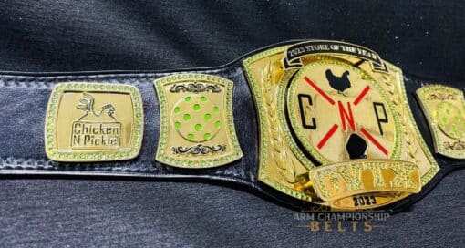 Top performer championship belt featuring intricate engravings and custom corporate branding