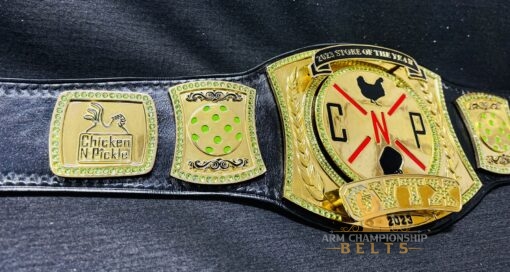 Interactive spinner center plate on a company recognition championship belt.