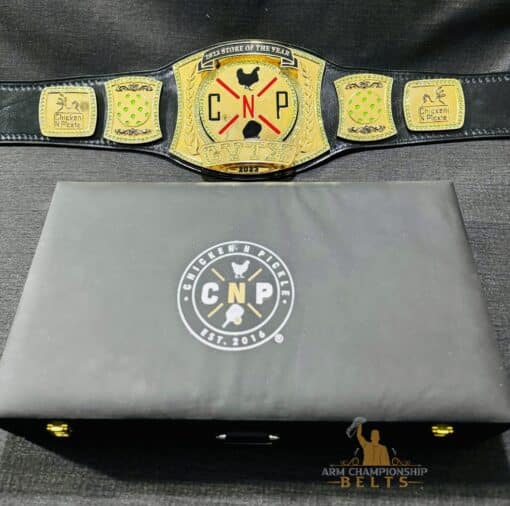 Corporate award championship belt featuring custom engravings and a genuine leather strap