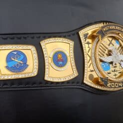 Championship belt with custom military logos, celebrating honorary achievements.