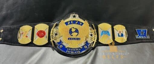 A fun, customizable party championship belt with colorful plates and leather strap, ideal for special occasions.