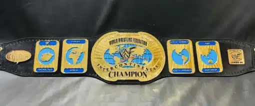 Collection of various WWF World Championship Belts, illustrating the evolution of design and style over the years.