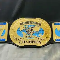 Collection of various WWF World Championship Belts, illustrating the evolution of design and style over the years.