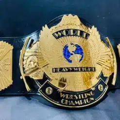 Buy the authentic WWF Winged Eagle Championship Belt replica, crafted with 24K Swiss gold-plated zinc plates and genuine leather. Perfect for wrestling fans and collectors.