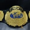 WCW Tag Team Championship Belt highlighting the deep etching and intricate design