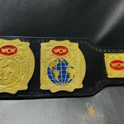 Close-up of the high-quality paint finish on the WCW Tag Team Championship Belt Side plates