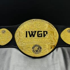 WGP Tag Team Championship Belt replica, featuring shiny gold plates and a genuine leather strap.