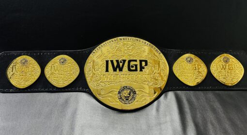 WGP Tag Team Championship Belt replica, featuring shiny gold plates and a genuine leather strap.