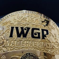 IWGP Tag Team Championship Belt with a shiny gold plate finish, crafted for wrestling fans.