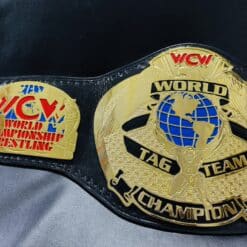 WCW World Tag Team Championship Belt with genuine leather strap and snap fasteners.