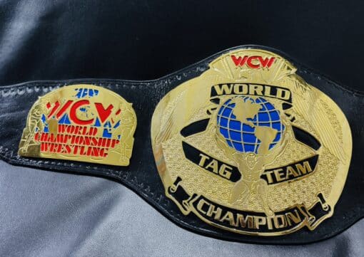 WCW World Tag Team Championship Belt with genuine leather strap and snap fasteners.