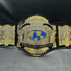 Close-up shot of the Unified USWA World Title Belt detailing its intricate etching and chrome finish.