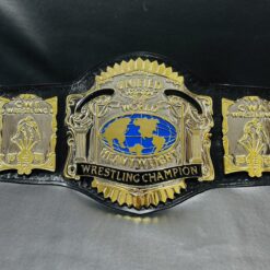 Close-up shot of the Unified USWA World Title Belt detailing its intricate etching and chrome finish.