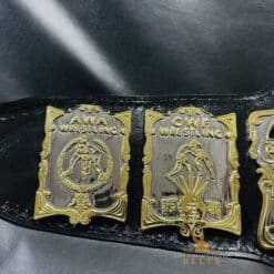 Side profile of the USWA World Title Belt, highlighting its quality craftsmanship and leather strap.